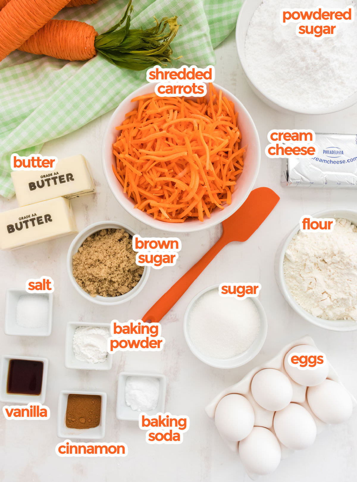All the ingredients you will need to make Carrot Cake Cookies including carrots, powdered sugar, cream cheese, flour, eggs, sugar, brown sugar, butter, salt, baking powder, baking soda, cinnamon and vanilla.