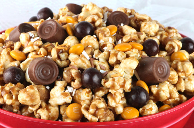 Little known fact .. Wookies love Chewbacca Caramel Corn. It is a popular on Kashyyyk and the Millennium Falcon. It would be a great for a Star Wars Party or a Family Movie Night. Yummy, buttery Caramel Popcorn that is ready to eat in less than 15 minutes. Pin this delicious Star Wars popcorn recipe for later and follow us for more great Star Wars Party Ideas. #StarWars #StarWarsFood #Chewbacca #Popcorn #CaramelCorn #StarWarsParty