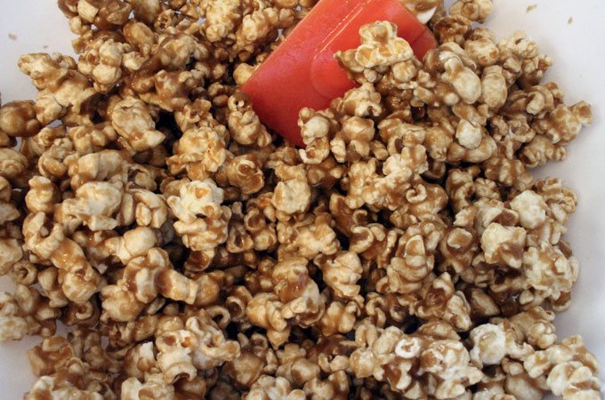 Pour Caramel mixture onto popcorn