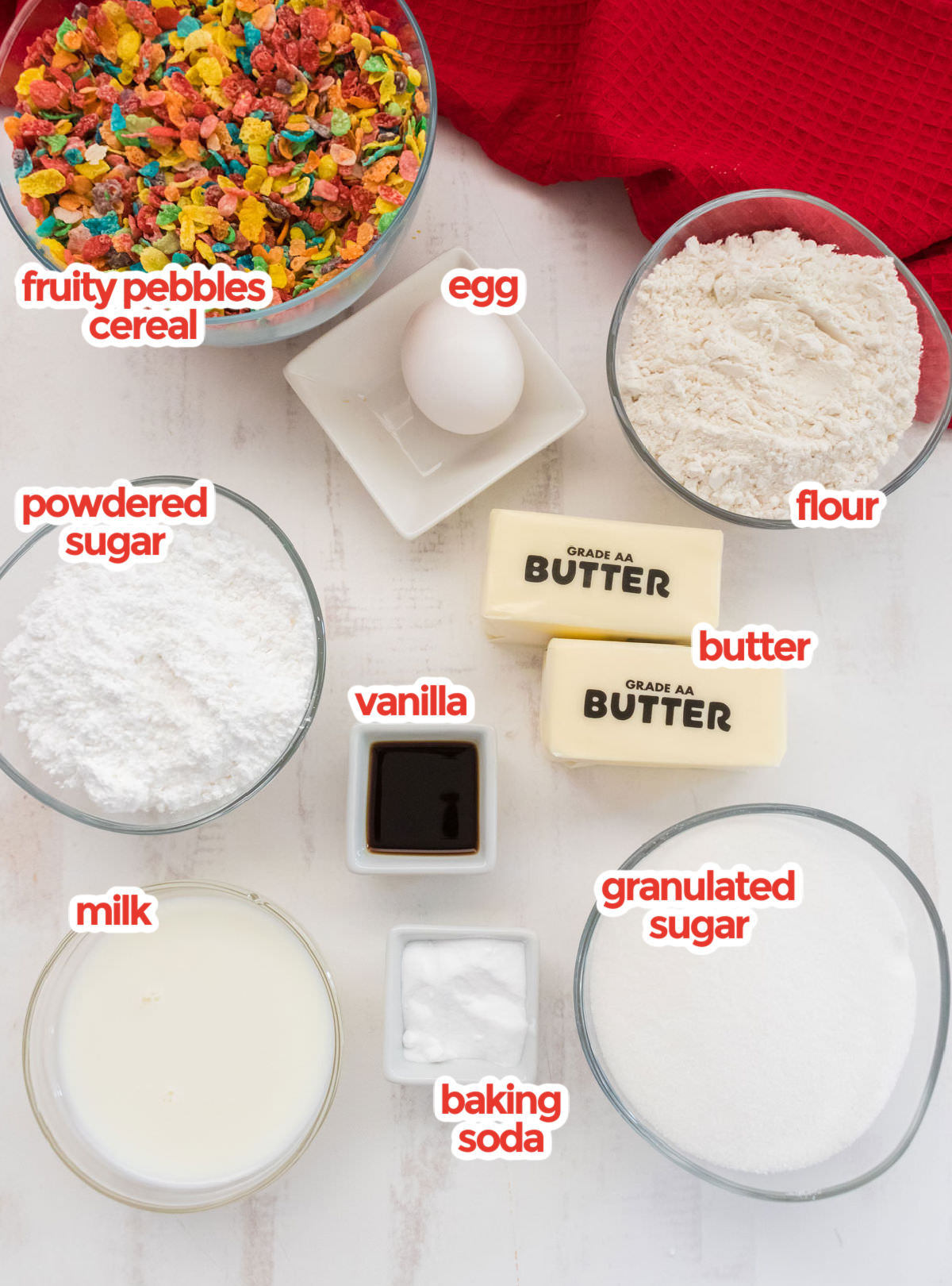 All the ingredients you will need to make Fruity Pebbles Sugar Cookies including Fruity Pebbles Cereal, Granulated Sugar, Butter, Egg, Vanilla, Baking Soda, Flour, Powdered Sugar and Milk.