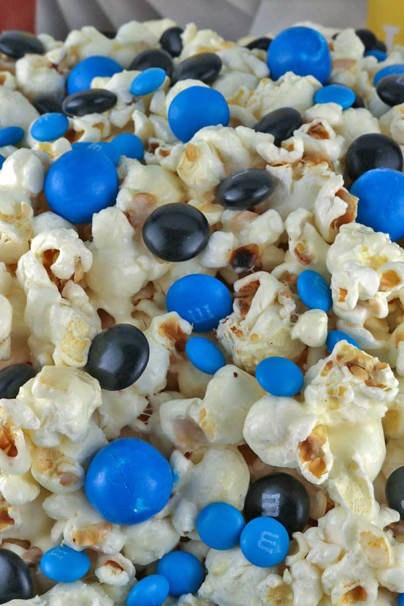 Jacksonville Jaguars Popcorn for those Jacksonville Jaguars fans in your life. Sweet, salty, crunchy and delicious and it is extremely easy to make. This delicious popcorn will be perfect at your next game day football party. a NFL playoff party or a Super Bowl party. Follow us for more fun Super Bowl Food Ideas. #jacksonvillejaguars #jaguars #superbowl #superbowlparty #superbowlfood #jacksonvillejaguarsfood