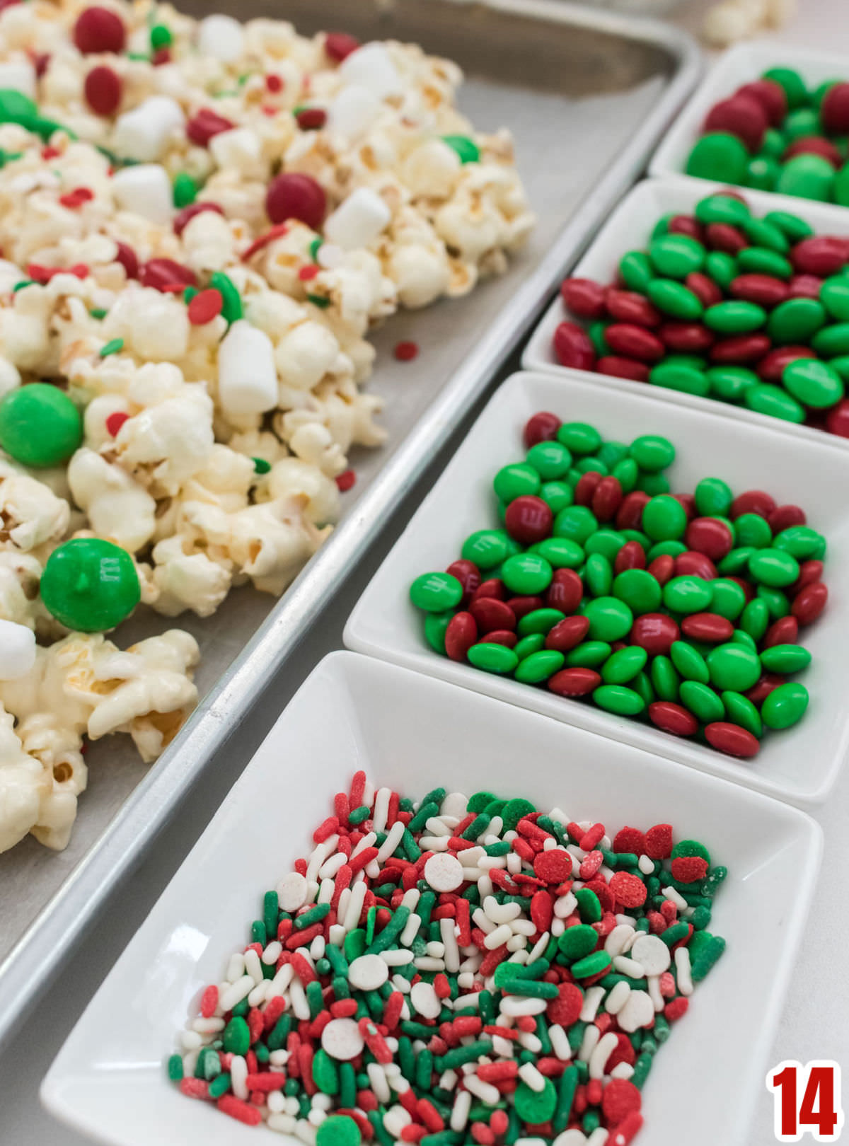 Closeup on all the Christmas colored candy mix-ins we used for the Marshmallow Popcorn.