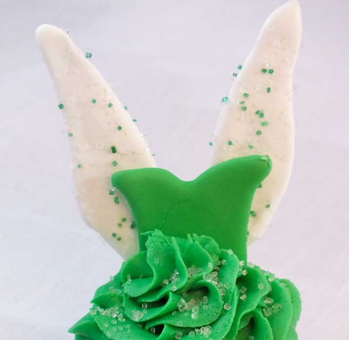 Tinkerbell Cupcakes - so cute and so delicious. Clap if you believe! We have all the directions to make these adorable Disney Tinker Bell Cupcakes that are perfect for a Tinkerbell Birthday Party. Follow us for more great Tinkerbell Party Ideas.